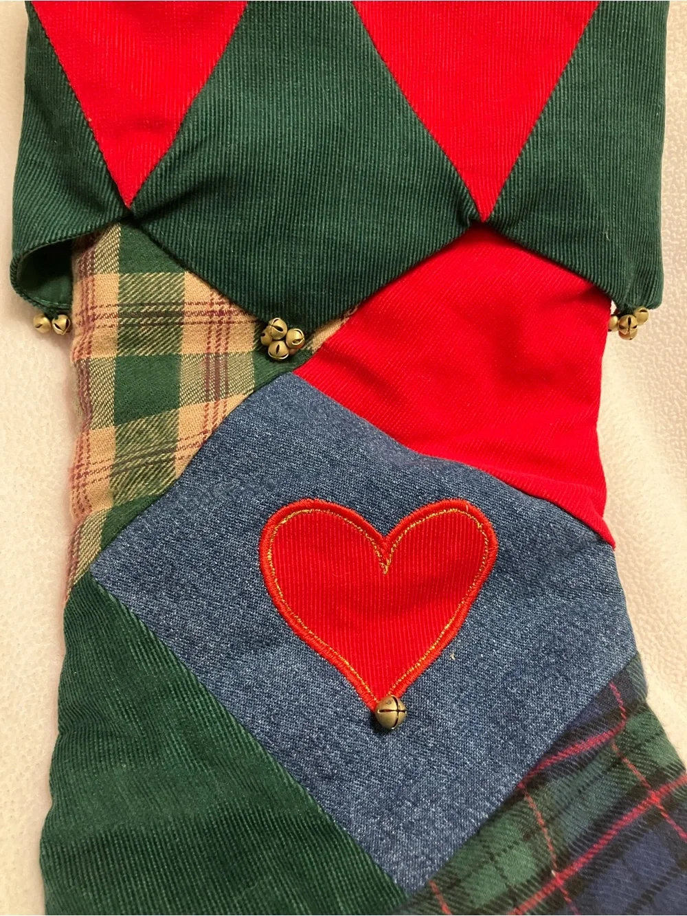 retired Pier 1 Imports patchwork quilt Christmas stocking. Red heart. Tiny bells